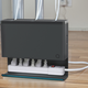 Illustration for article titled The Plug Hub Is a Pretty Way to Hide Your Ugly Cables